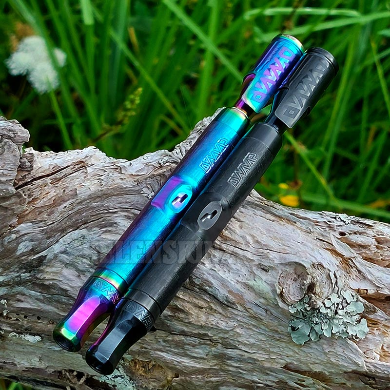 DynaVap M7 XL Obsidium & Rosium Pens on a log NZ